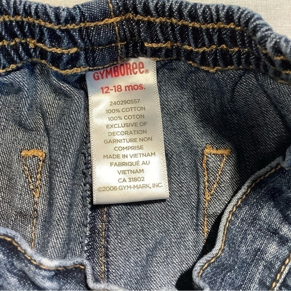 GYMBOREE blue jeans with red flowers and bows. Size 12-18 months. - Picture 5 of 5